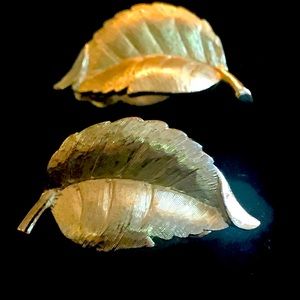 Gold tone leaf clip earrings